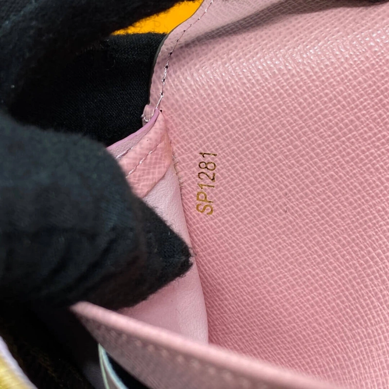 Outside f Louis Vuitton Vivienne Sailing Damier Ebene Sarah Wallet Pink - Image 9